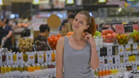 Young american model is posing for photo standing asian supermarket. Stock Footage 115601093