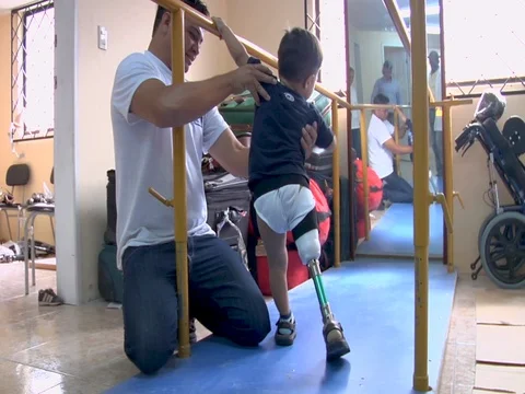 Young boy with one leg and a prosthetic ... | Stock Video | Pond5
