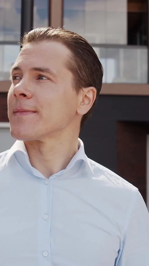 Young and attractive freelancer working outdoor. Office worker or businessperson Stock Footage 308481094