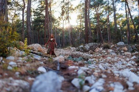 Young and beautiful dancer practicing intently among natural landscapes. A yo Stock Photos