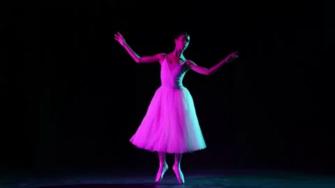 Young and beautiful graceful classical ballet female dancer in white dress Stock Footage 211996816