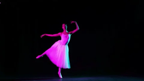Young and beautiful graceful classical ballet female dancer in white dress Stock Footage 211997426