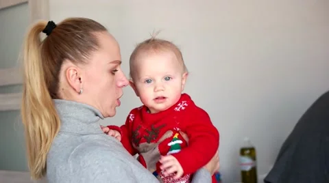 A young and beautiful mother talking with her child Stock Footage 59339643