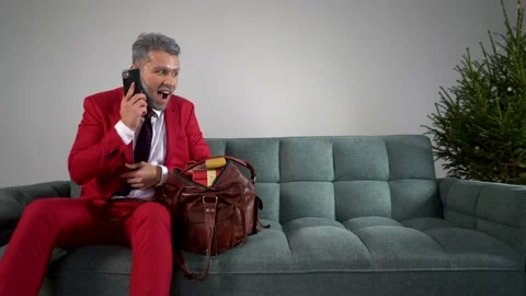 A young and cool guy with a gray beard , Call by phone and win the draw. Stock Footage 167651730