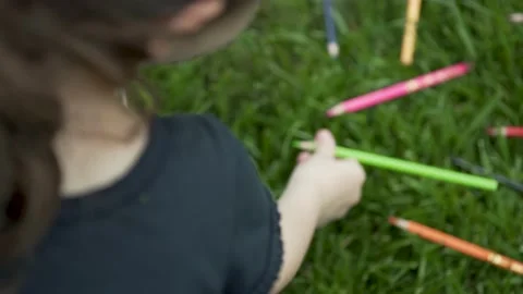 A Young And Creative Artist Paints A Landscape on green grass. Stock Footage 132778053