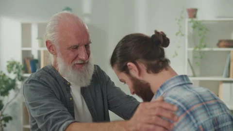 Young and elderly men talk about life, psychological support for each other Stock Footage 263406388