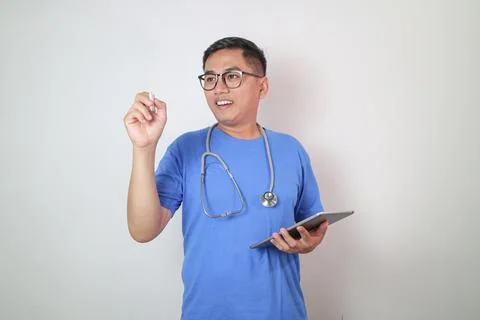 Young and handsome smart Asian doctor wearing surgical hygiene protective m.. Stock Photos