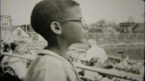 Young and old gather at Wrigley Field for baseball game 1950s home movie 5638 Stock Footage