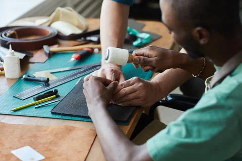 Young Apprentice Learning Craft Stock Photos