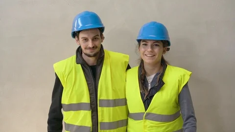 Young apprentice with security helmet, isolated on background Video stock 123214730