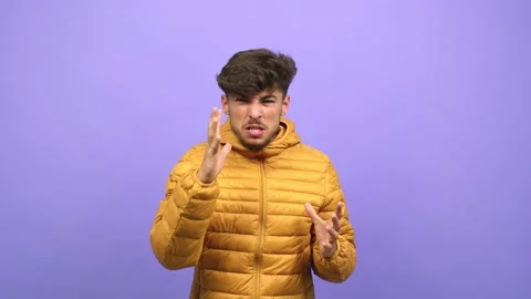 Young arab man screaming angry, expression of madness and mental instability, Stock Footage 138664878