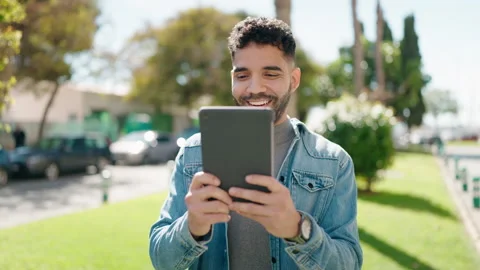 Young arab man smiling confident having video call at park Video stock 171047253