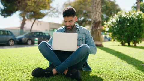 Young arab man smiling confident using laptop at park Video stock 172410059