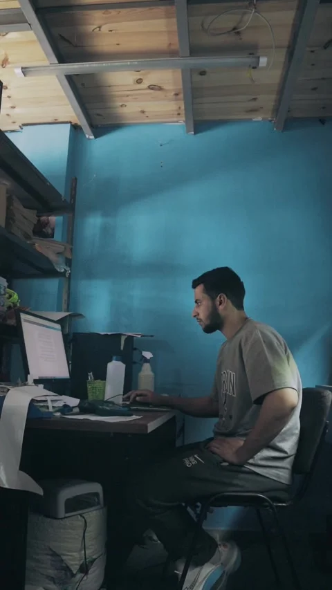 Young Arab Worker Smiling At Computer In Moroccan Print Shop Stock Footage 339427116