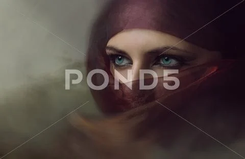 Young arabian woman in hijab with sexy blue eyes. Toning Stock Photos
