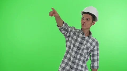 Young architect on a green chroma key Stock Footage 91808512