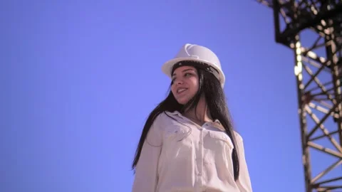 Young architect in helmet, engineer, designer, employee, white woman Stock Footage 240340578