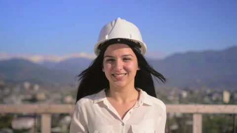 Young architect in helmet, engineer, designer, employee, white woman Stock Footage 240340882