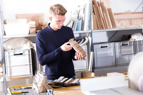 Young architect making architectural model 写真素材