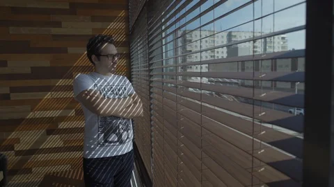 Young architect in the office.Rear view of a young successful businessman Vídeos de archivo 112140464
