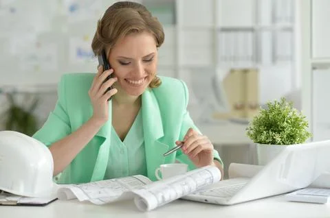 Young architect talking on phone Stock Photos