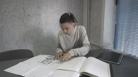 Young architect at work Stock Footage 96087587