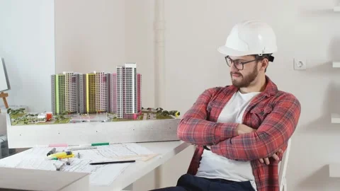 Young architect working in the office. Stock Footage 130727404