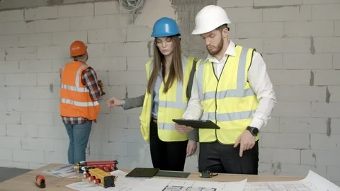 Young architects and technician discussing Stock-Footage 125457958
