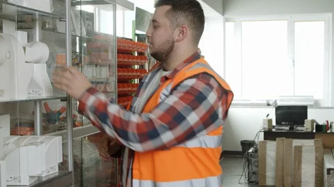 Young architects checking plastic parts Stock Footage 125457196