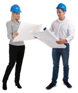 Young architects reading plan full body portrait standing occupation job is.. Stock Photos