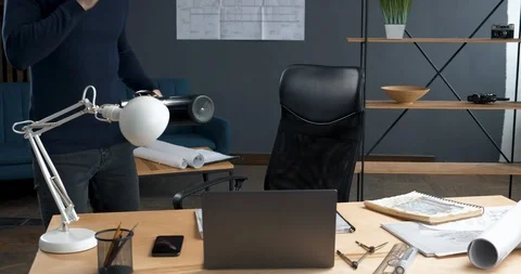 Young Architectural Engineer starting to work at Office. Loft style Stock Footage 126158379