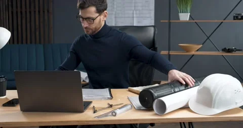 Young Architectural Engineer starting to work at Office. Loft style Stock Footage 145437207