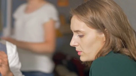 Young art team leader talking with coworker in casual creative office. Stock Footage 80470484