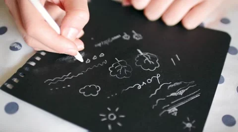 Young Artist Sketching a Picture on Black Paper Stock Footage 59085178