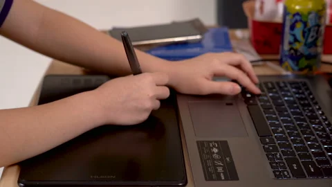 Young artist using drawing tablet Stock Footage 131911254