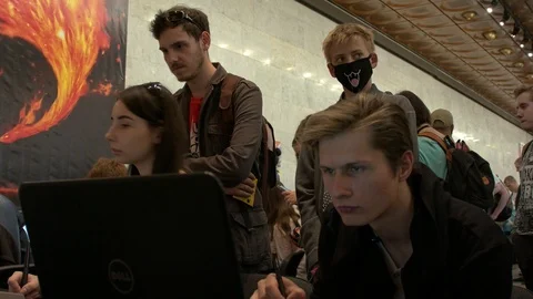 Young Artists Drawing On Graphic Tablets at Comic Con Stockbeeldmateriaal 90135019