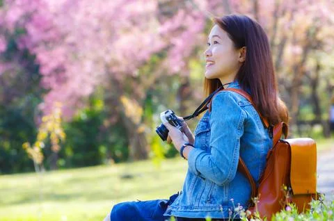 Young Asian backpacker. Stock Photos
