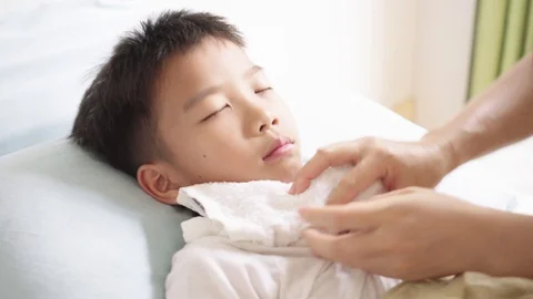 Young Asian boy getting sick Stock-Footage 103971142