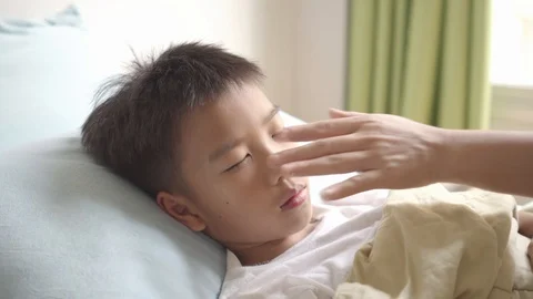 Young Asian boy getting sick Stock Footage 105500859