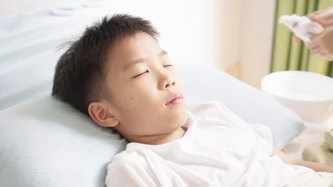 Young Asian boy getting sick Stock-Footage 107499114
