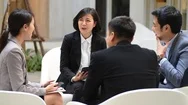 Young Asian Business Team Discuss At The Outdoor Stock Footage
