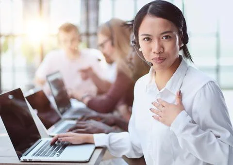 Young asian camera operator looking at the camera Stock Photos