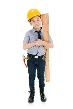 Young asian child construction engineer Holding equipment Foto stock