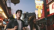 Young Asian Couple Enjoy And Have Fun Outdoor Lifestyle Together In Street Stock Footage