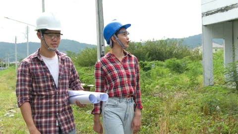 Young asian couple foreman engineering Stock Footage 140631025