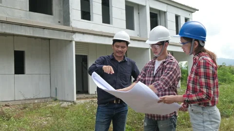 Young asian couple with foreman engineering Stock Footage 140838168