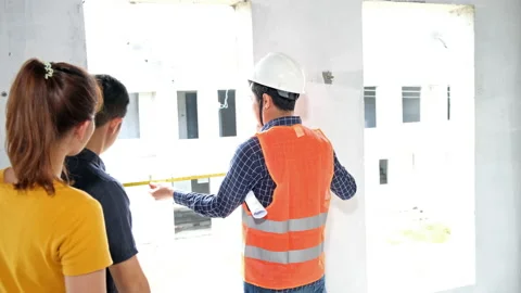 Young asian couple with foreman engineering Stock-Footage 140838985