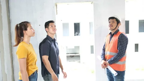 Young asian couple with foreman engineering Stock-Footage 140839023
