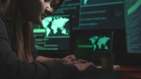 Young Asian Couple Hackers Using Computer Hacking, Code On Multiple Computer Stock Footage 161458037
