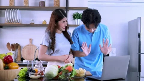 Young Asian couple live stream online cooking in the kitchen. Stock Footage 245246766
